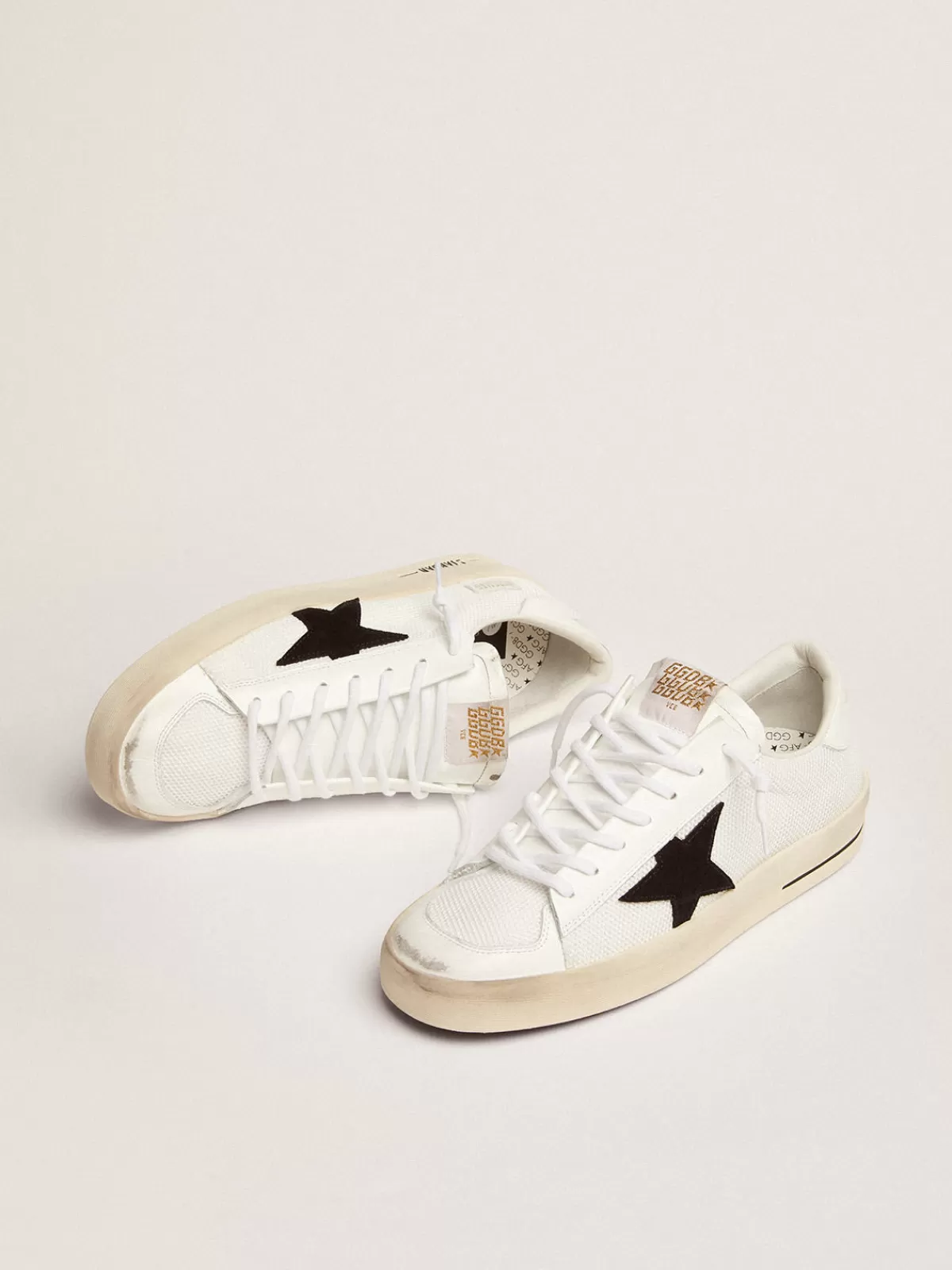 Golden Goose Men's Stardan in white mesh with black suede star Clearance