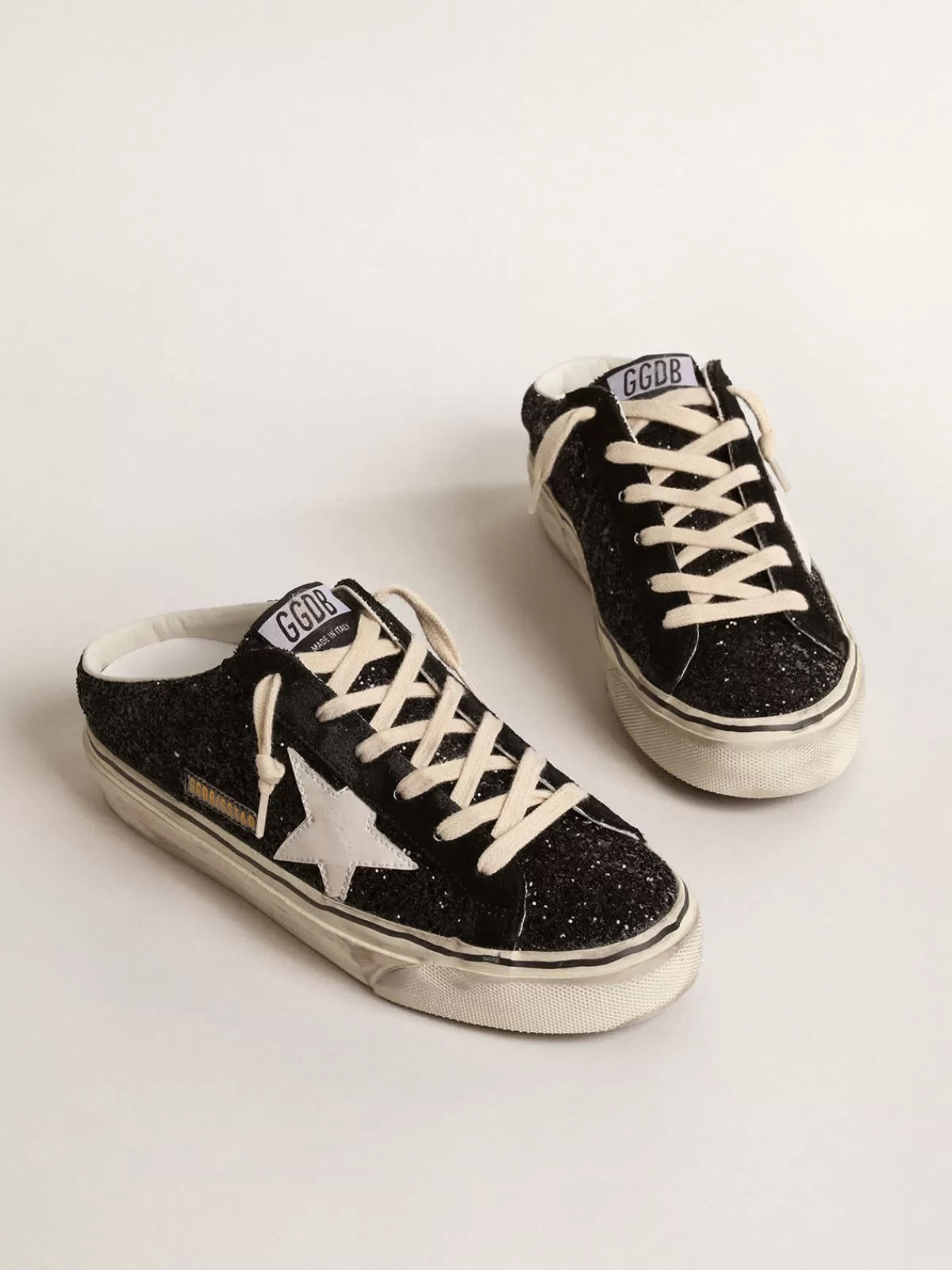 Golden Goose Super-Star Sabots in black glitter with white bio-based star Outlet