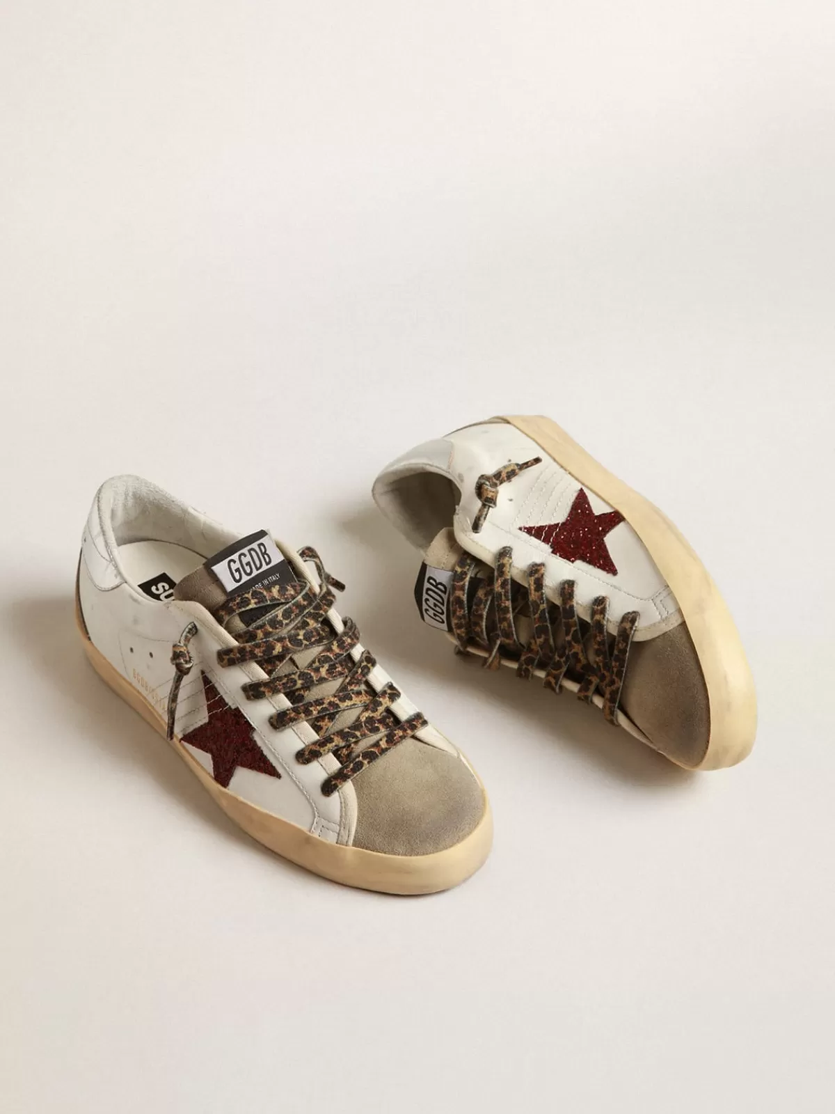 Golden Goose Super-Star with burgundy glitter star and silver heel tab white New