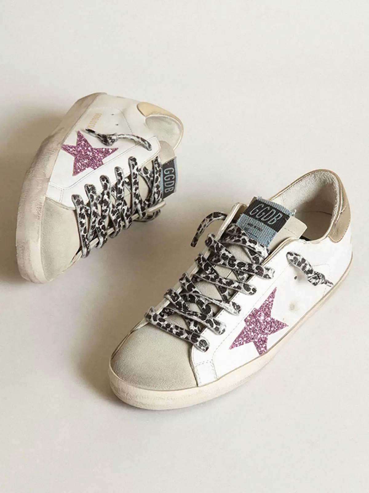 Golden Goose Women's Super-Star with glitter and gold heel tab Fashion